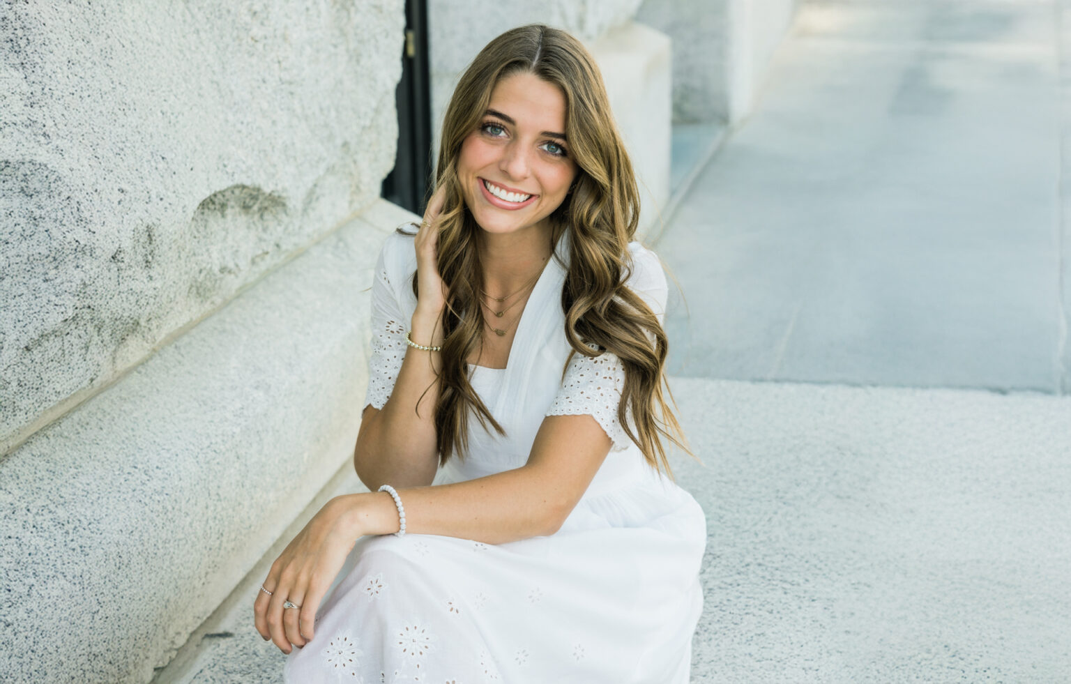 Smiling Female Patient Sitting Outdoors