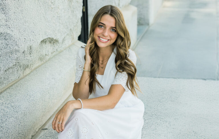 Smiling Female Patient Sitting Outdoors