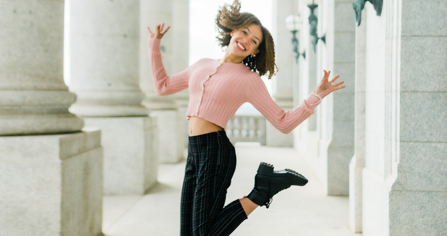 Smiling Sweetwater Orthodontics Patient Jumping