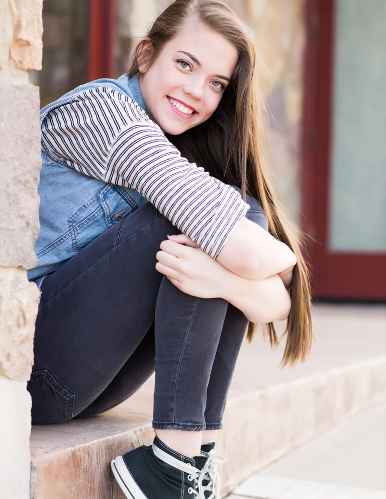 Smiling Teen Patient Sitting Outdoors